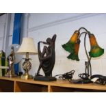 Four table lamps of varying shape and style
