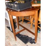 A mahogany demi-lune hall table