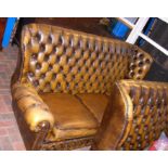 A three seater Chesterfield settee