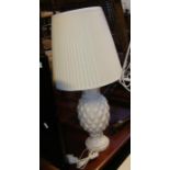 A white alabaster 'pineapple' table lamp with shad