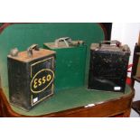 Three vintage petrol cans including Esso