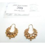 A pair of new 9ct gold hoop earrings