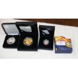 Various collectable coins in presentation packs