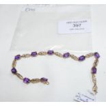 An attractive amethyst and diamond bracelet in 9ct