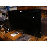 An LG 42 inch flat screen TV with remote
