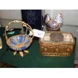 A gilt metal antique casket with glass top togethe