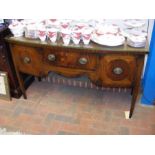 An antique bow fronted sideboard - with glass prot