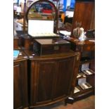 A gentleman's mahogany dressing chest with circula