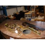 A selection of brass maritime items, including a h