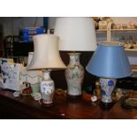 Four ceramic table lamps and shades