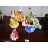 Seven Royal Doulton female figurines