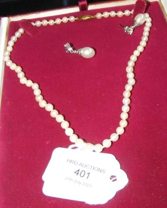 A pearl necklace with 9ct clasp and dress earrings