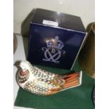 A Royal Crown Derby bird paperweight with box - 15