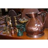 A 2 gallon copper jug together with other metal wa