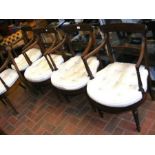 A set of six mahogany dining armchairs with curved