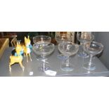 Six Babycham glasses together with two plastic dee