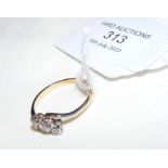 A new 18ct white gold diamond three stone ring