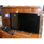 A Sony Bravia 32inch flatscreen TV complete with r