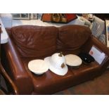 A G-Plan brown leather style two seater settee