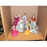 A quantity of Royal Doulton female figurines