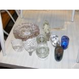 A collection of glassware including three model he