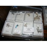 A selection of six new silver animal pendants on c