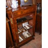 A Victorian inlaid display cabinet