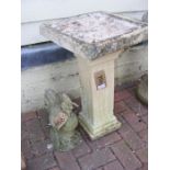 A square cast stoneware birdbath, together with a