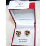 A pair of new 9ct gold knot stud earrings