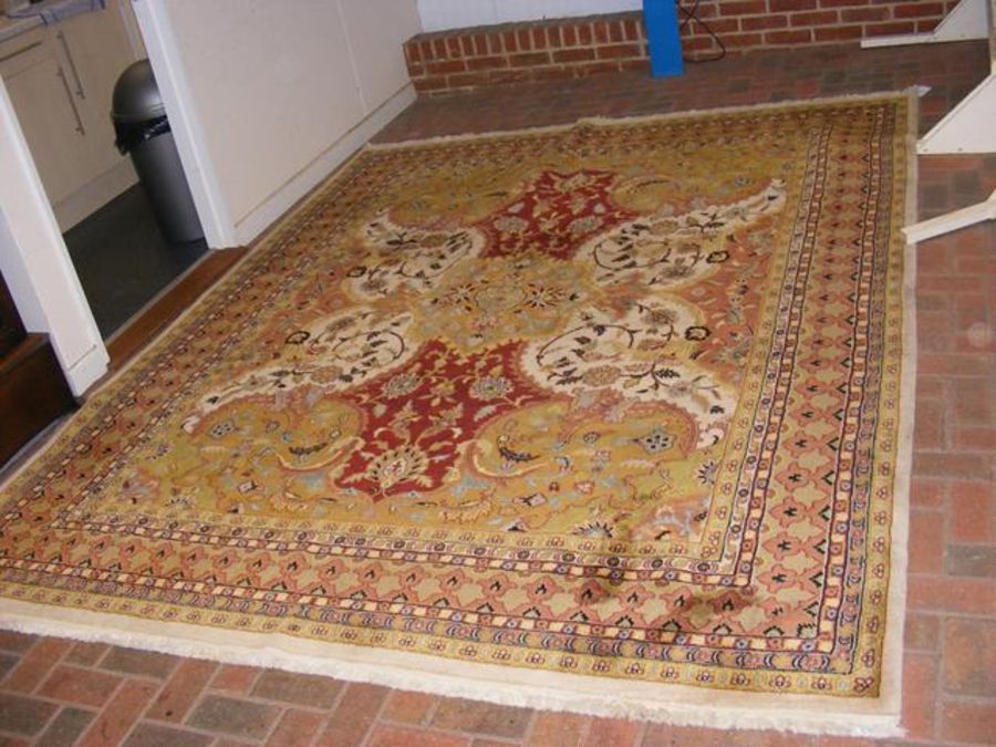 A Middle Eastern - West Persin carpet with geometric border and