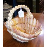 An unusual shell basket - 23cm high