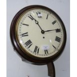 A Victorian mahogany cased circular wall clock wit