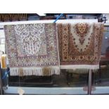 Two silk rugs