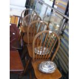Four spindle back chairs together with two silver