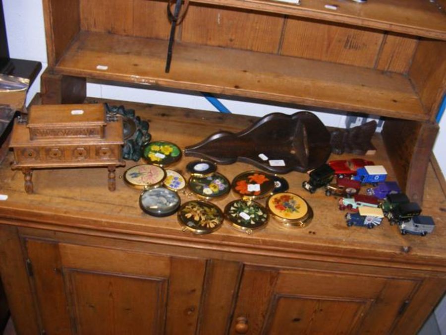 A selection of collectables including die cast veh