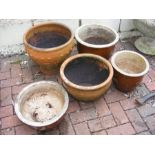 Five garden planters of varying shape and size - t