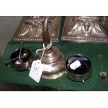 A silver wine funnel together with a pair of silve