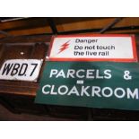 An old railway enamel sign 'Parcels & Cloakroom'