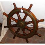 An antique wooden and metal bound ship's wheel - 7