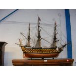 A model boat 'The Victory' on stand