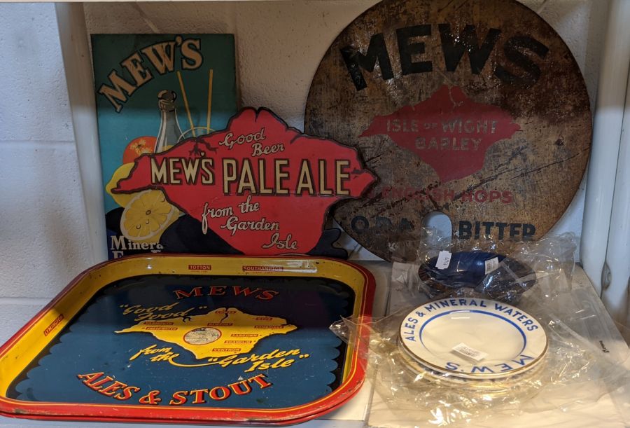 A pair of vintage Mew's 'Good Beer from the Garden Isle' enamel trays, together with assorted Mew, L