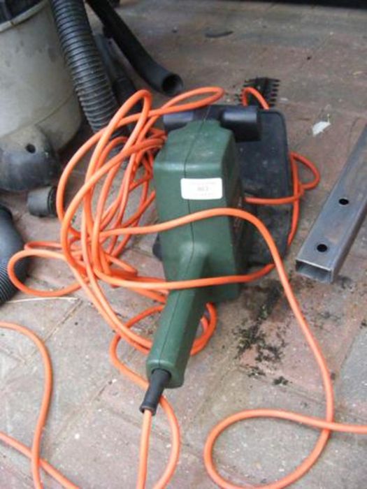A Black and Decker GT150 power tool, together with