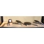 A silver and tortoiseshell dressing table set incl