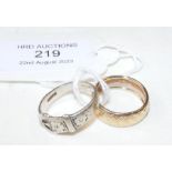 A 14ct gold wedding band together with one other r