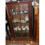 An antique display cabinet