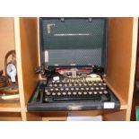 A vintage Corona typewriter in case