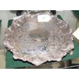 A 23cm diameter silver salver, London hallmark 186