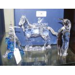 Three boxed Swarovski crystal ornaments - includin