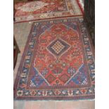 A Middle Eastern rug with geometric border - 205cm