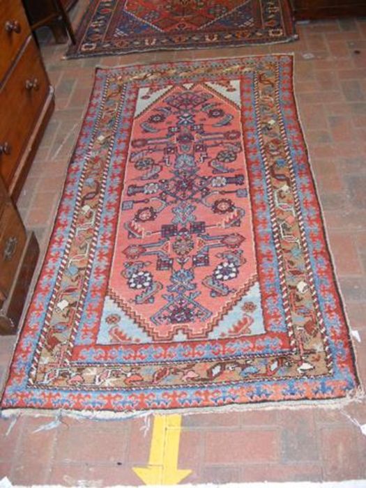 A Middle Eastern rug with geometric border - 195cm